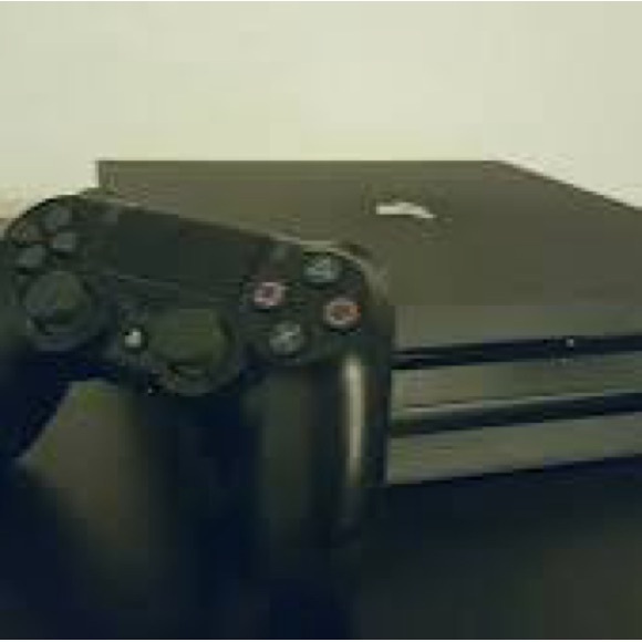 PS4 pro and remote Good condition 1Tb and HDMI cord - Picture 2 of 4